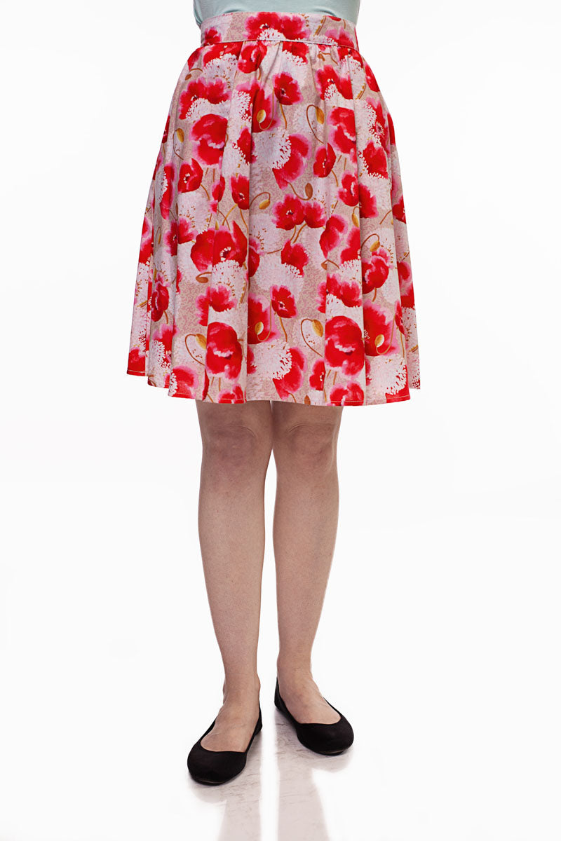 close up of our pink floral skirt on a model