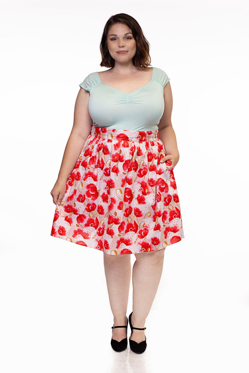 full size image of a plus size model wearing our pink floral a-line skirt