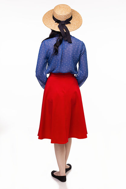 a back view of model wearing the charlotte skirt in red