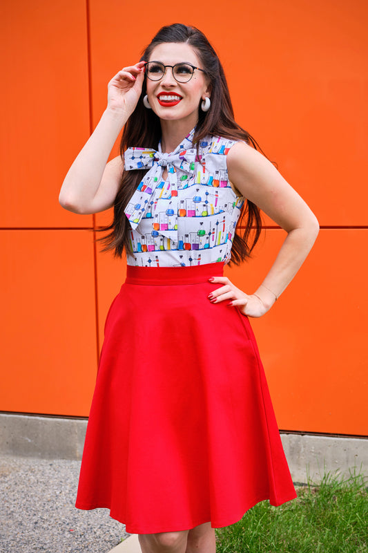 a model wearing the charlotte skirt in red