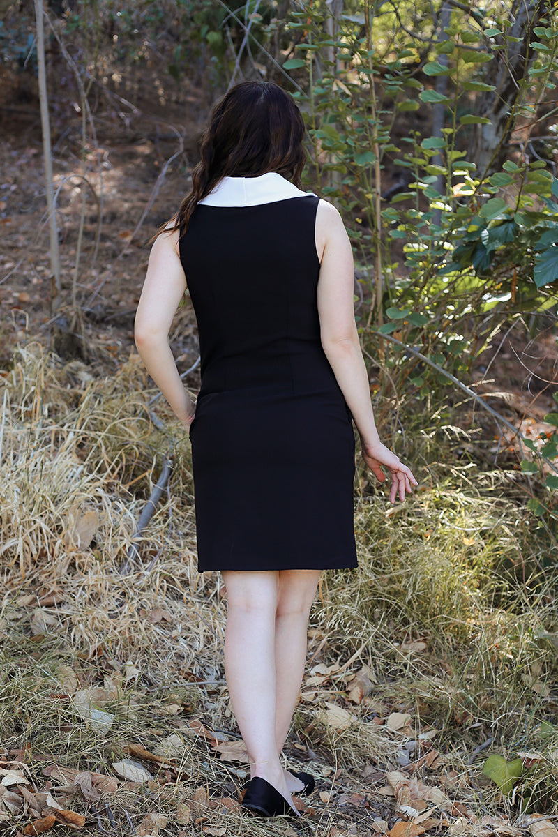 back shot of a model wearing a vintage inspired goth dress