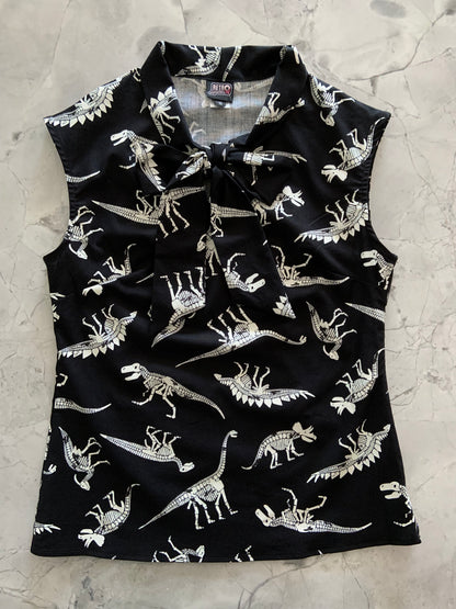 a flat lay of our glow in the dark fossils bow top