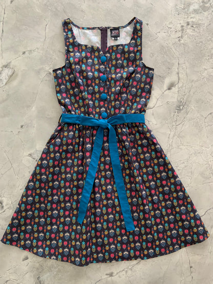 a flat lay of insects ida dress