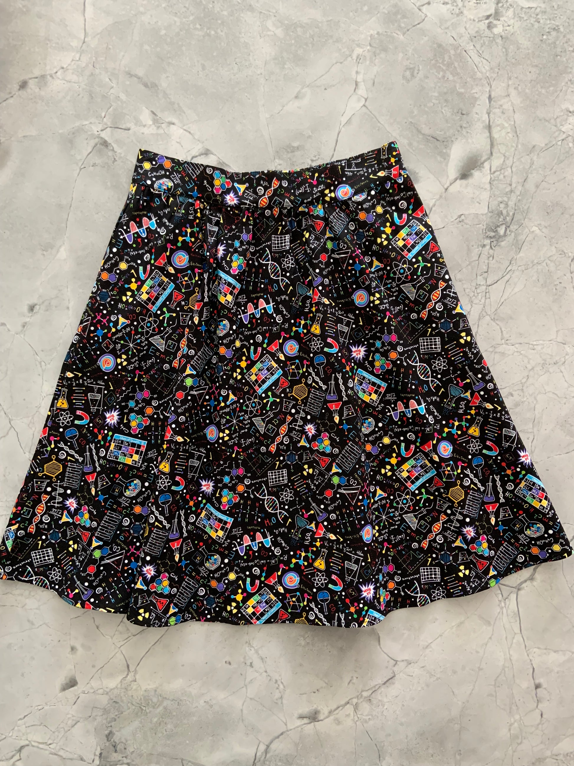 a flat lay front image of our science a-line skirt