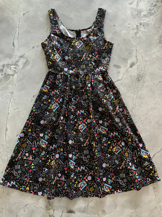 a flat lay of the front of the science fit and flare dress