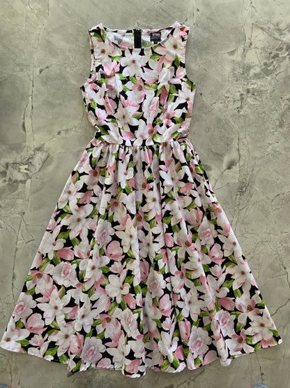 a flat lay of magnolia midi dress