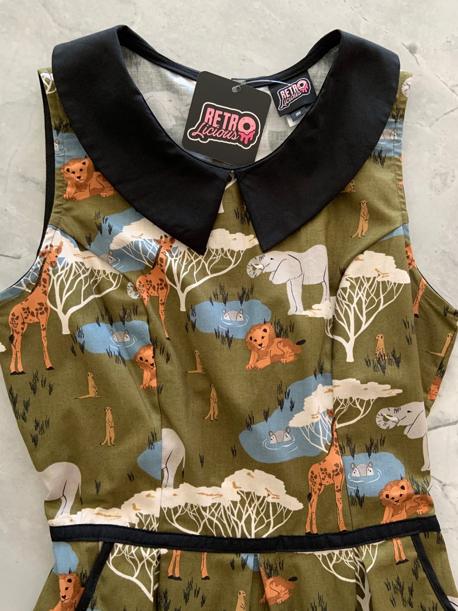 a flat lay of safari collared dress