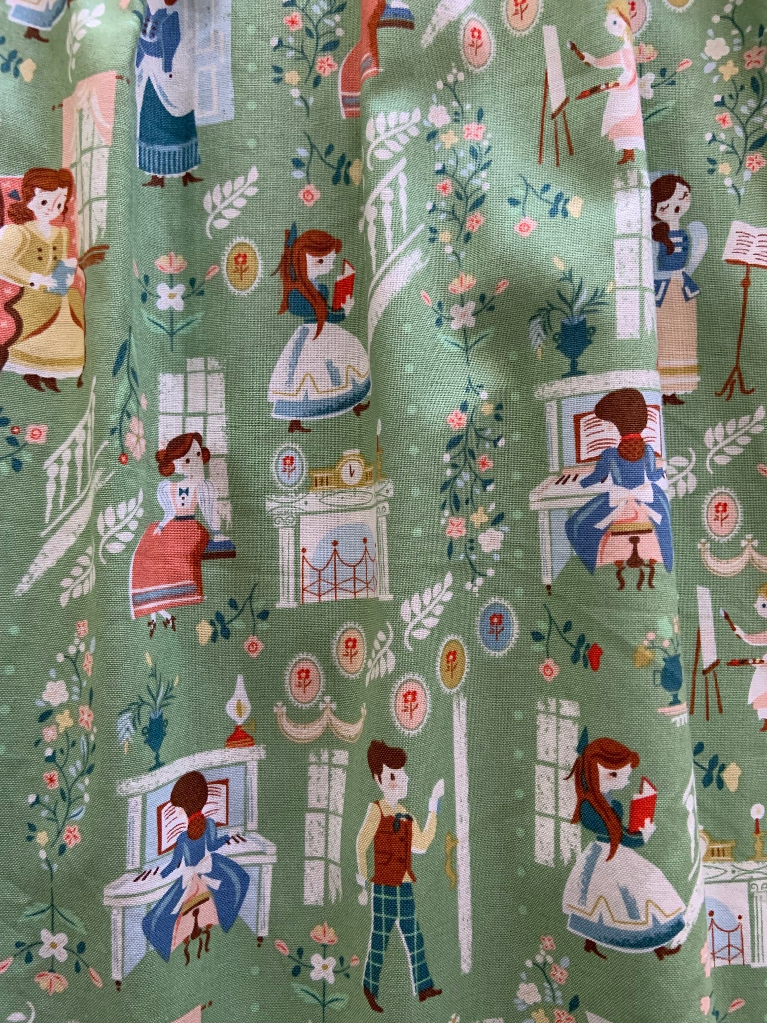 a close up of fabric of little women dress