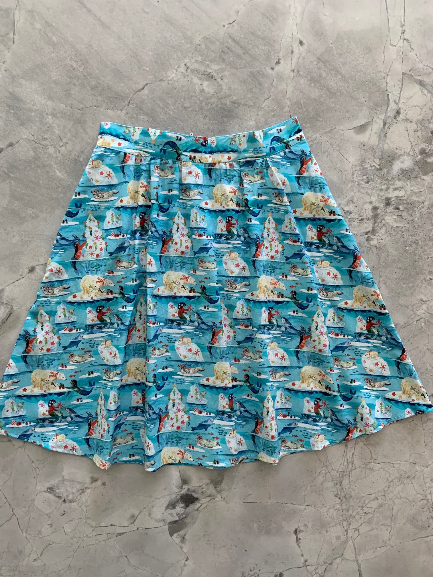 a flat lay of arctic a-line skirt