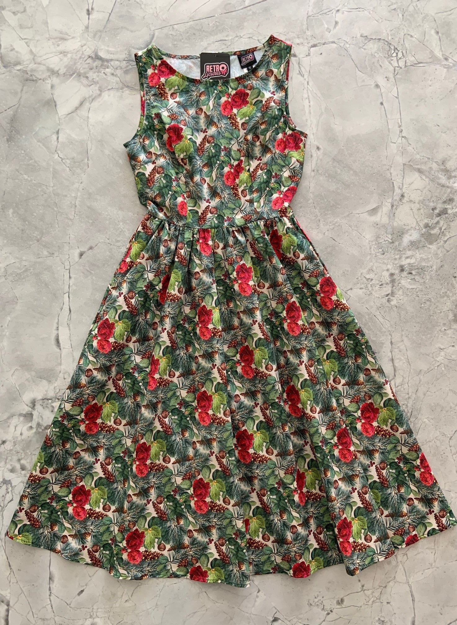 a flat lay of holiday vintage midi dress