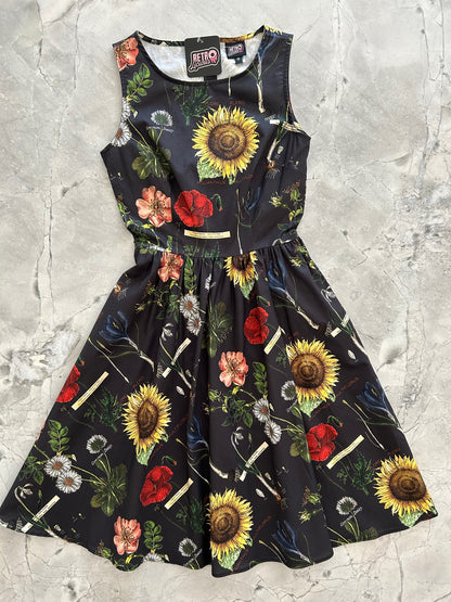 a flat lay of the front of the botany vintage dress
