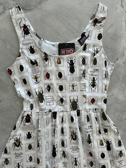 a flat lay of the front of the bodice of the bug stamps fit and flare dress