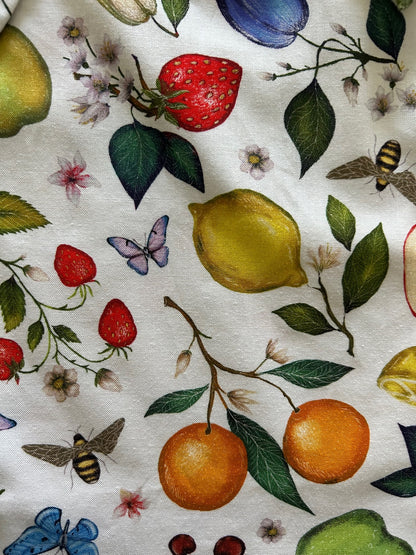 a close up of the fabric for our fruits and butterflies bow top