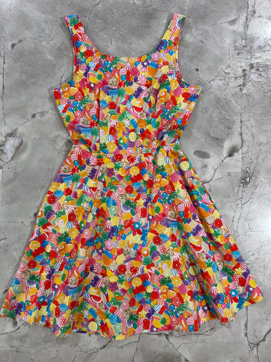 a flat lay of the candy skater dress