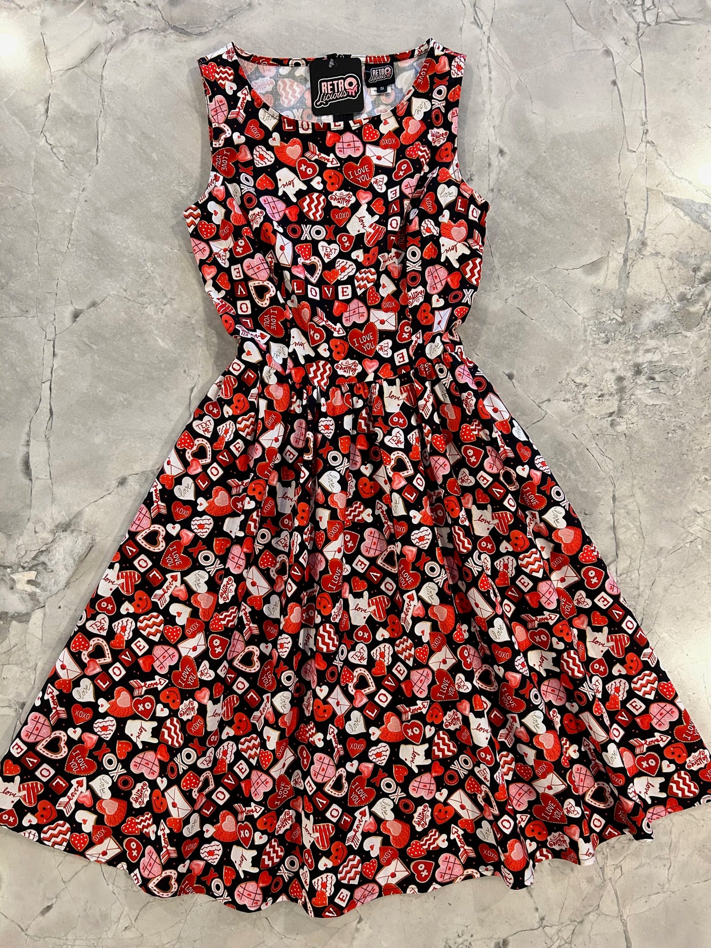 a flat lay of xoxo vintage dress