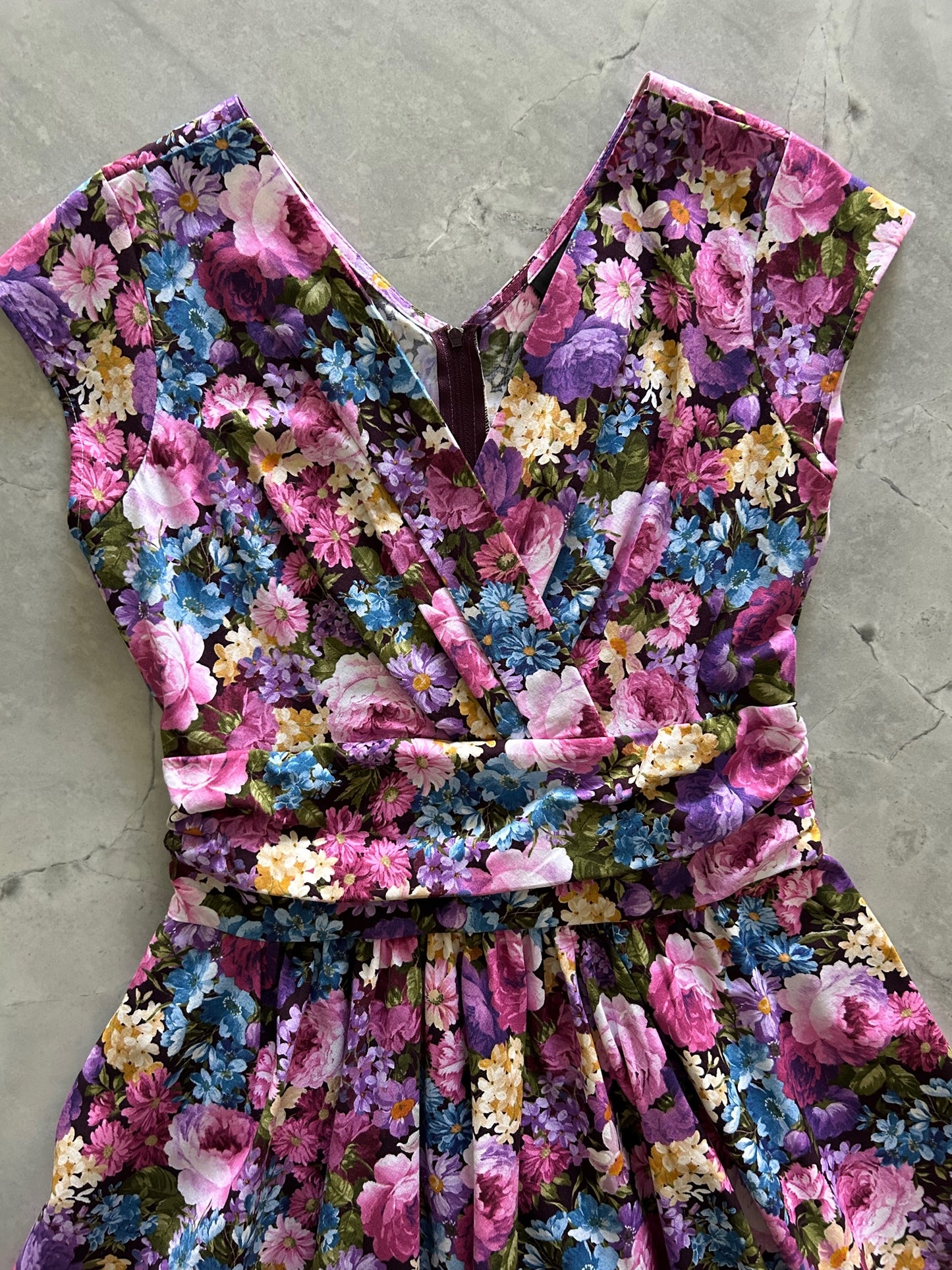 a flat lay of the vintage floral greta dress
