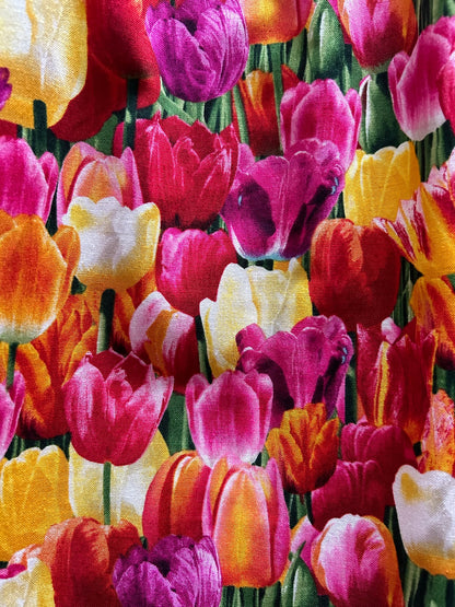 a close up of the fabric showing the tulips