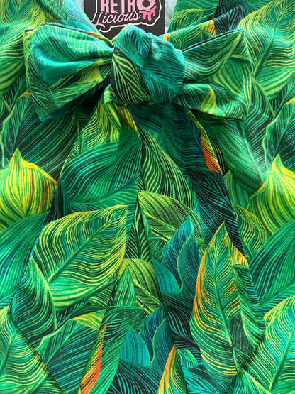 a close up of our leaves bow top