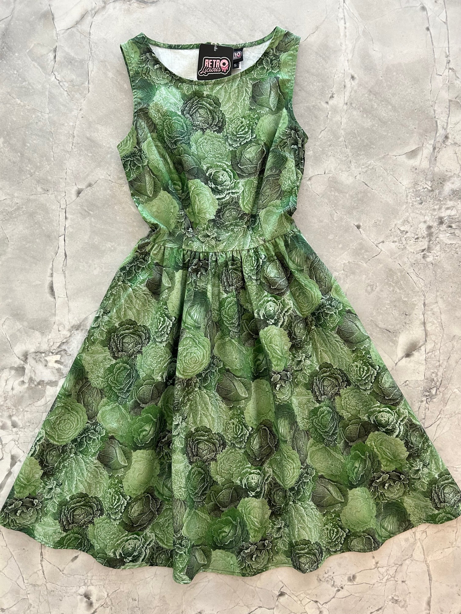 a flat lay of the lettuce vintage dress