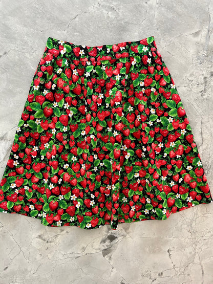 a flat lay of strawberries a-line skirt