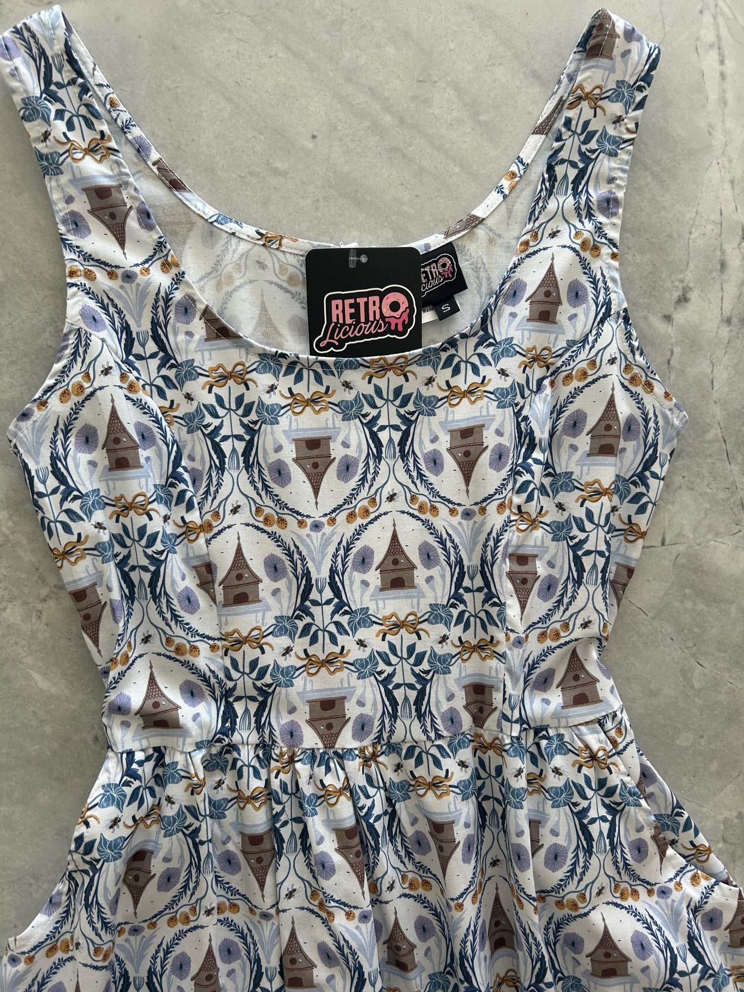 a close up of the front of the bodice of the honey i am home fit and flare dress