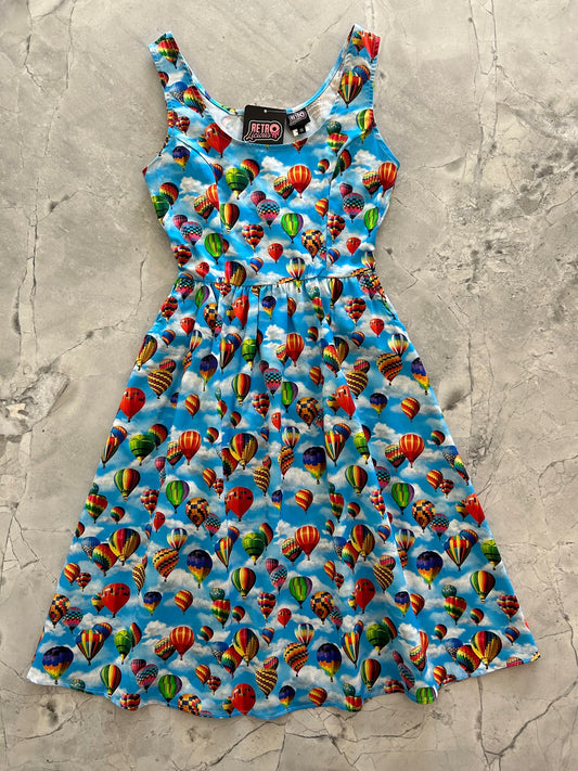 a flat lay of the hot air balloons fit and flare dress