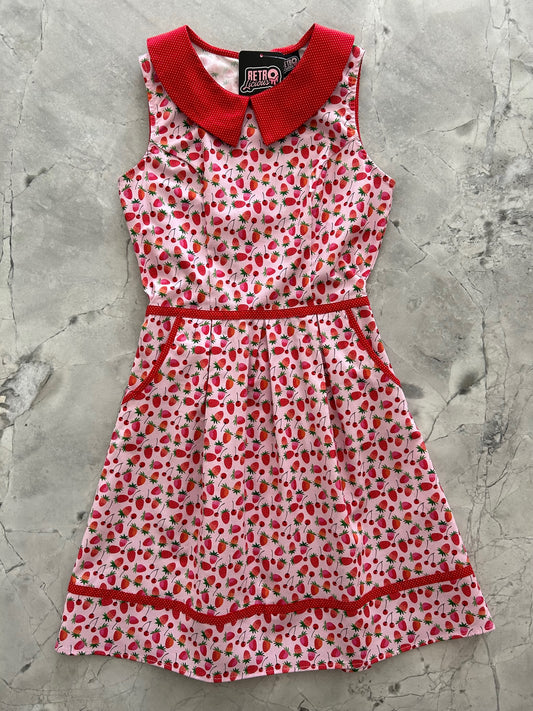 a flat lay of the berry cherry collared dress