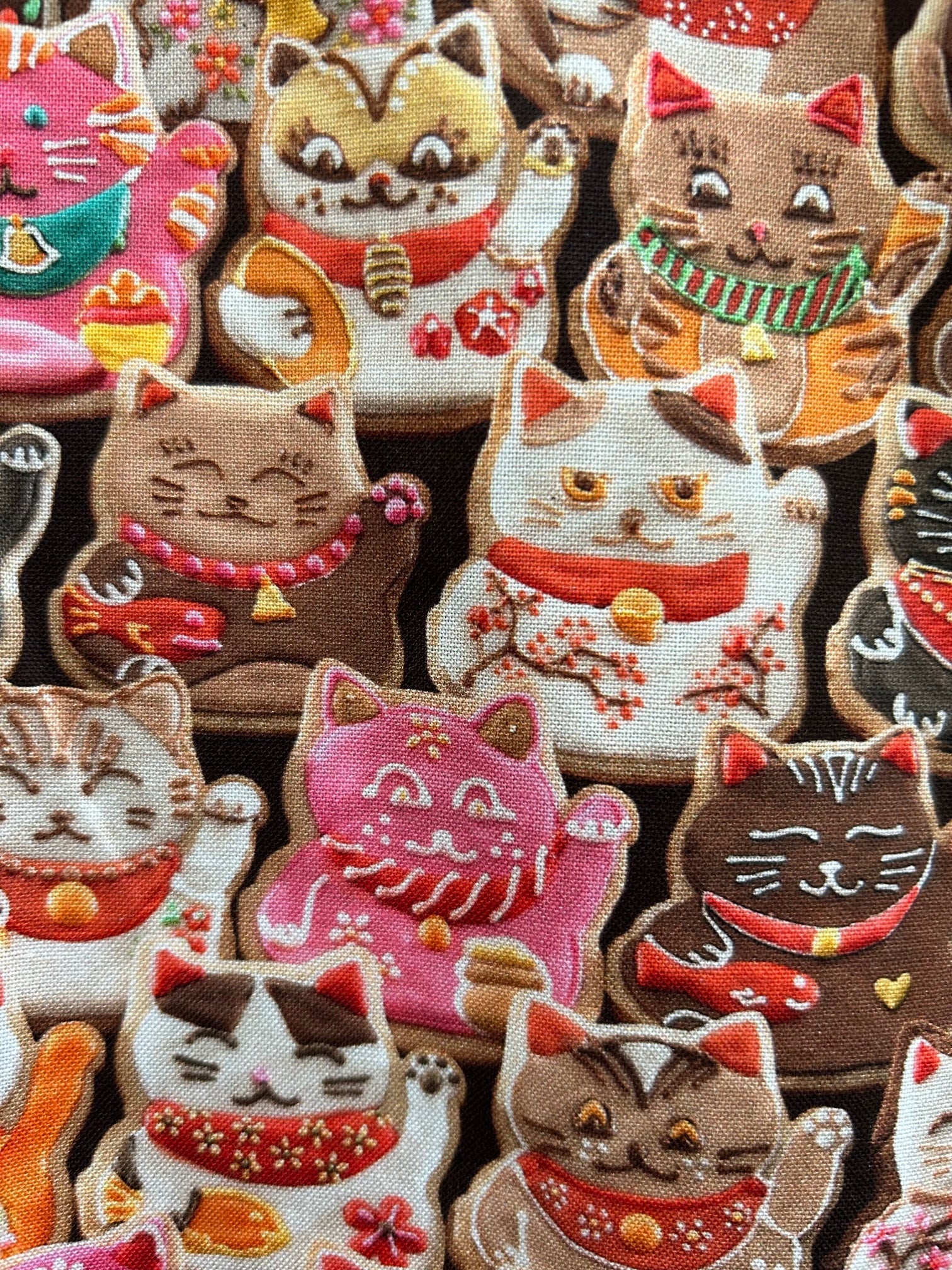 a close up of the fabric of the front of the cookie cats shorter length fit & flare dress