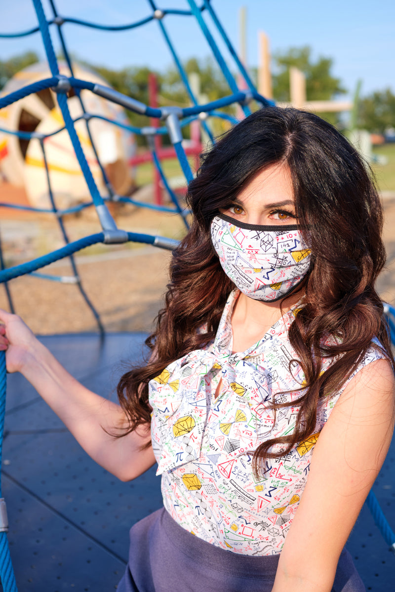 close up of model wearing our math rules bow top with matching face mask