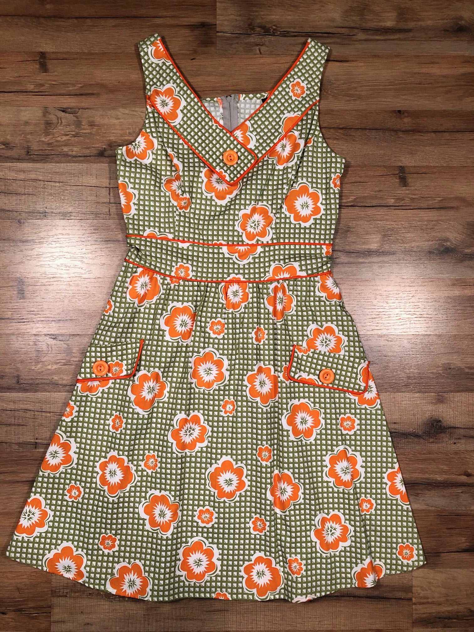 flat lay mod dress wtih orange contrast