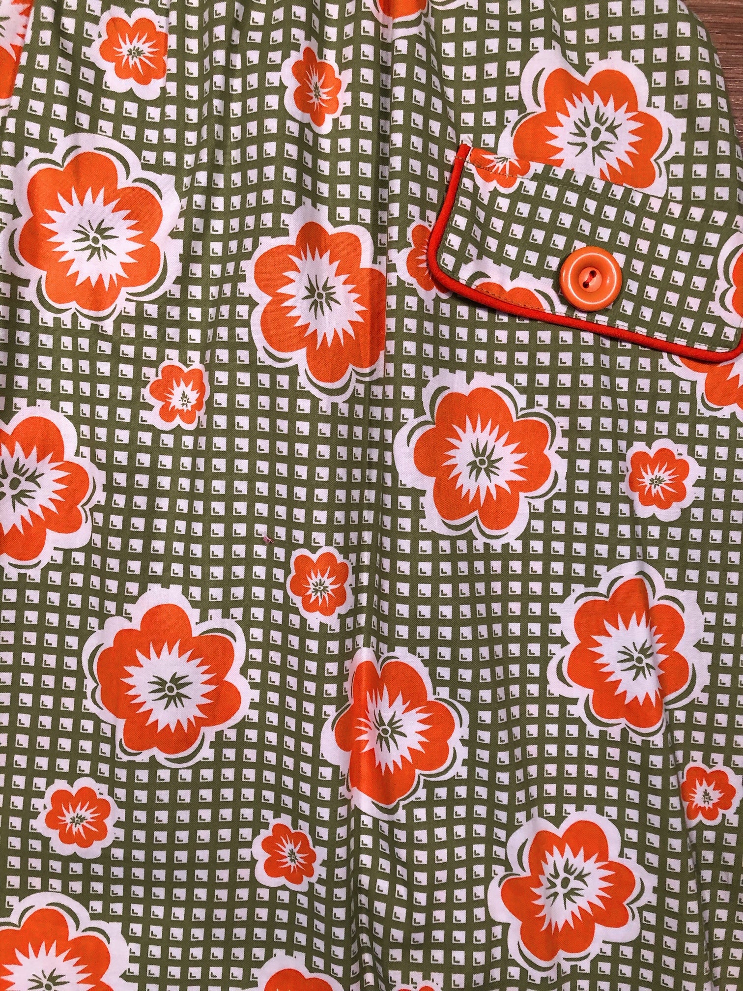 close up of pocket with orange button