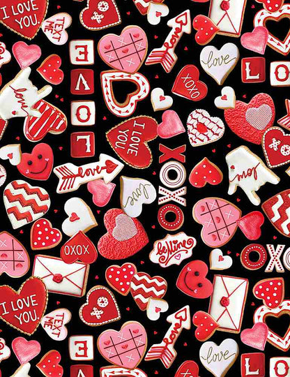 a close up of fabric showing xoxo and heart shapes