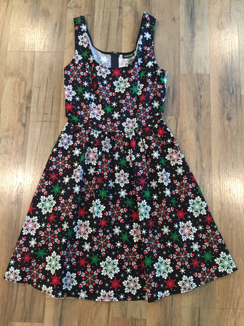 a flat lay of snowflakes dress