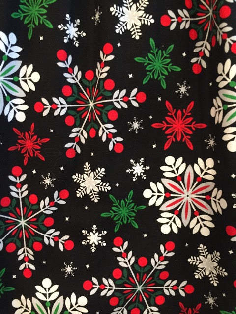 colorful snowflakes on black background