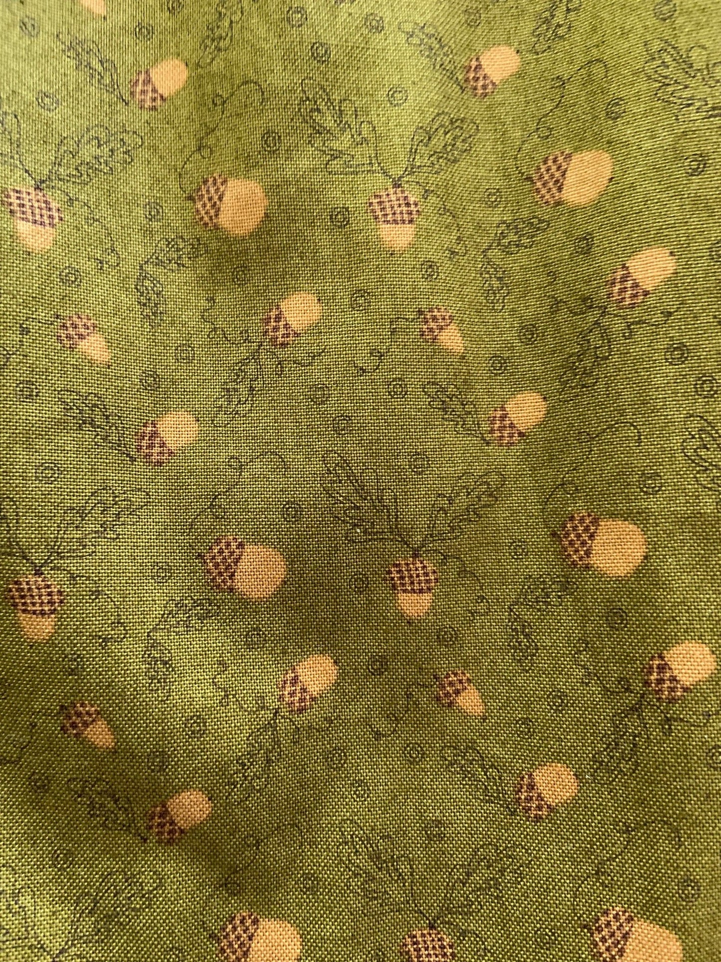 a close up of fabric of acorn collared dress