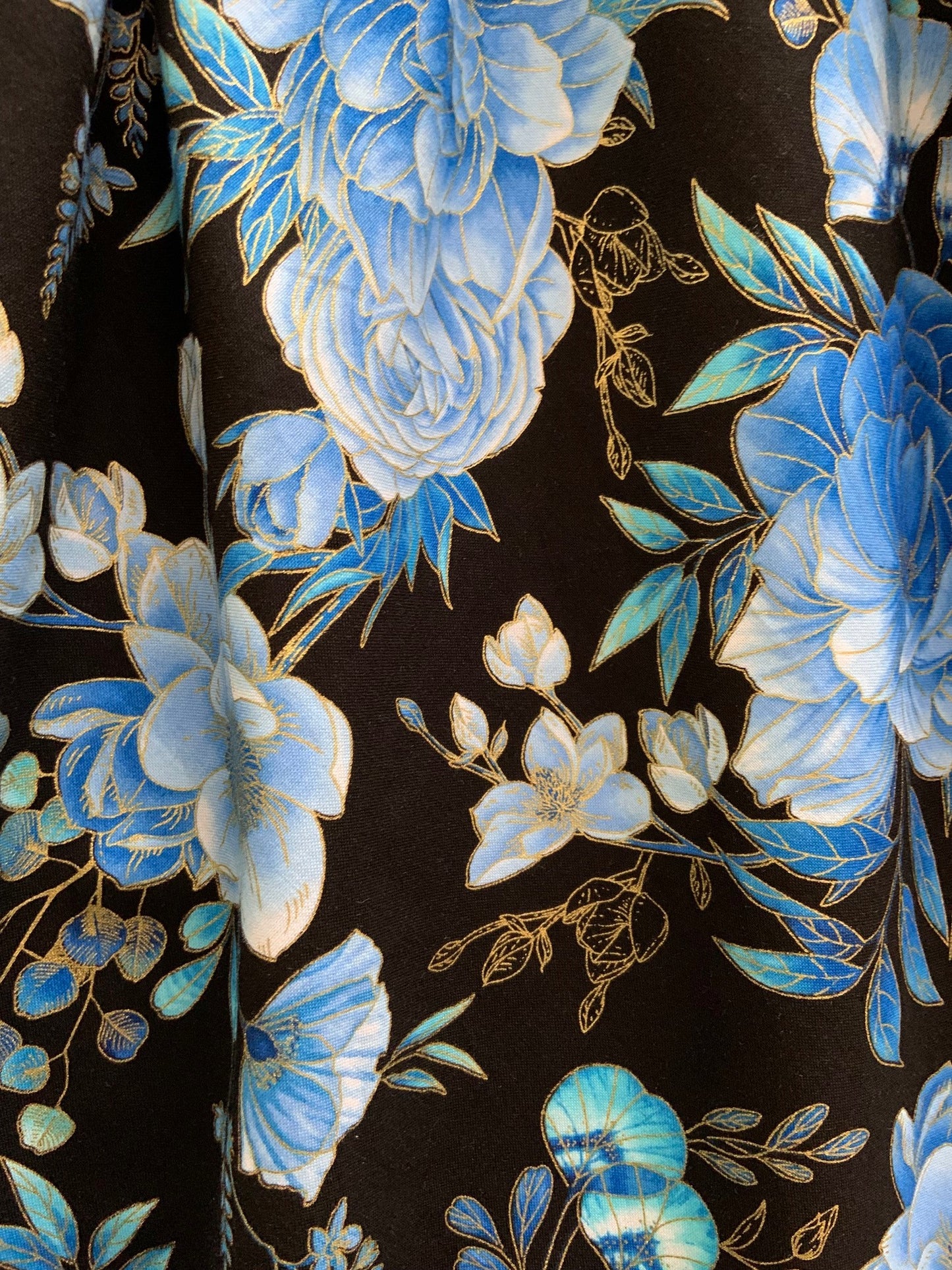 a close up of fabric of midnight floral vintage dress