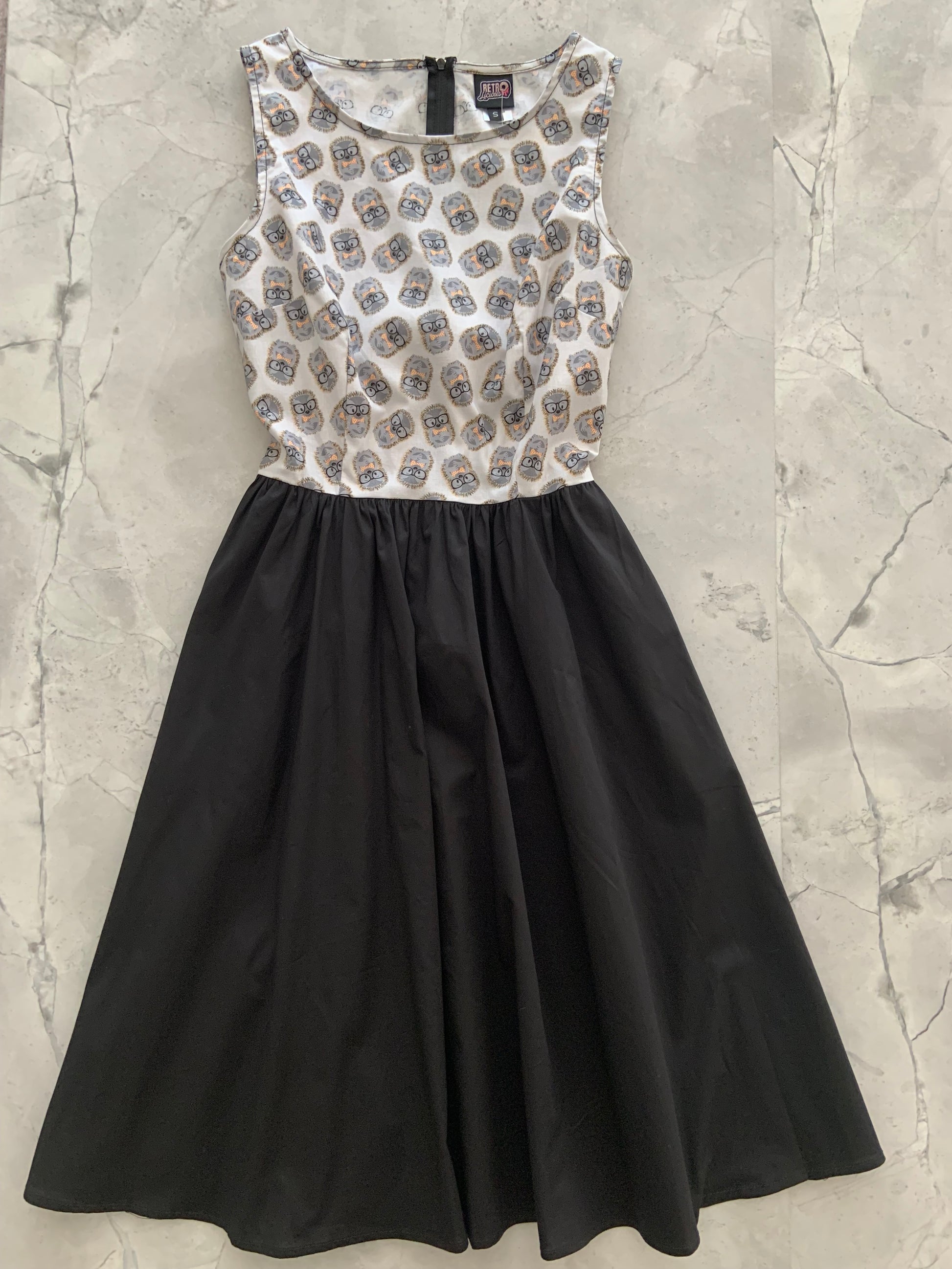 a flat lay image of the front of the hedgehog twofer dress 