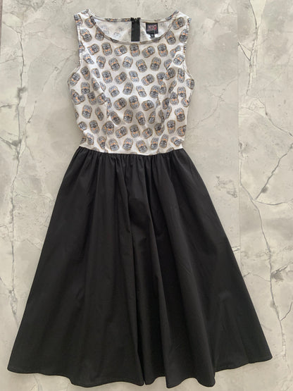 a flat lay image of the front of the hedgehog twofer dress 