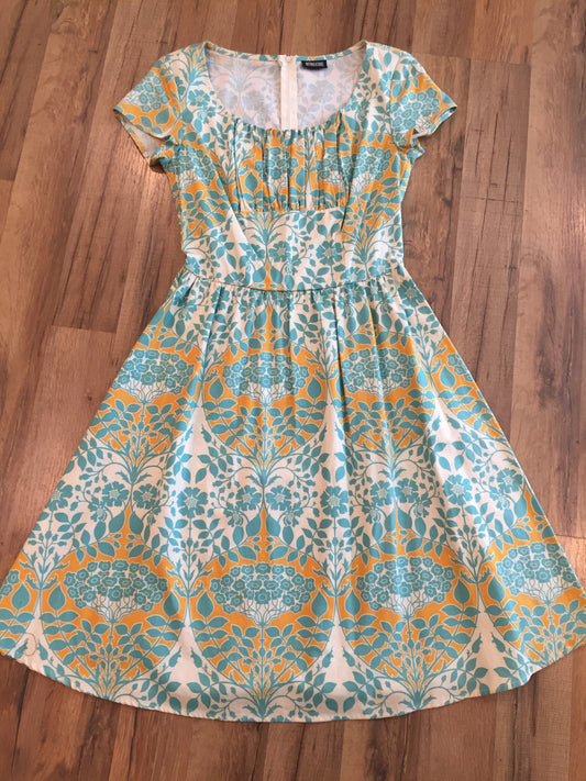 flat lay of vintage style agatha dress