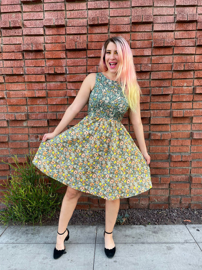 a full size image of a model standing in front of a brick wall wearing the cats in the fields twofer dress